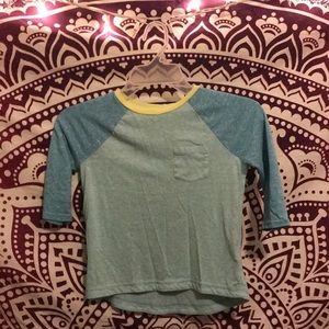 It is a great teal green shirt. It got too small .